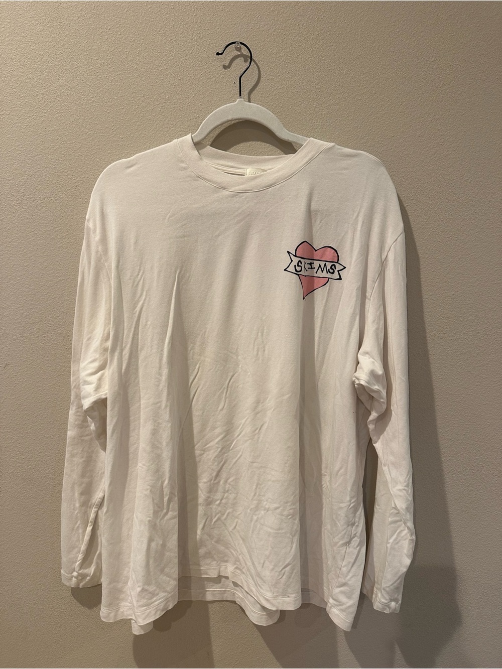 SKIMS White Long-Sleeve Tee with Pink Heart Logo